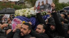 Hundreds in Beirut mourn journalists killed in Israeli strike