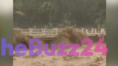 Moment Indonesian river overflows from heavy rain