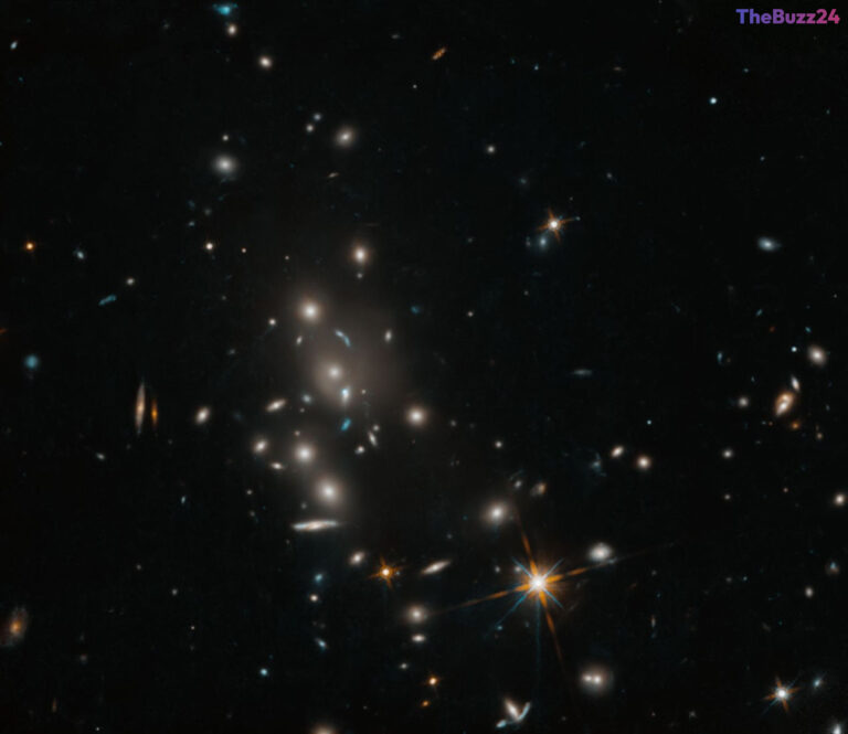 Hubble Telescope Reveals Stunning View of Distant Galaxy Cluster