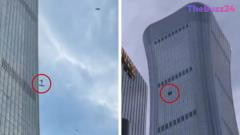 Emergency Response Underway After Small Aircraft Hits Beijing’s CITIC Tower