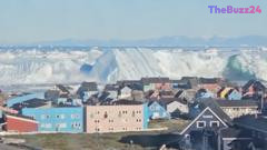 Dramatic Footage Captures Massive Iceberg Flipping Near Greenland Coast
