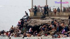 Humanitarian Crisis Unfolds as Hundreds of Migrants Swim to Spanish Enclave of Ceuta