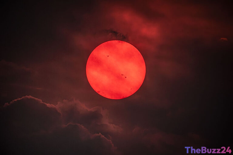 Wildfire Smoke Transforms Sun into Eerie Red Orb Over British Columbia
