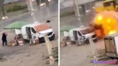 Terrifying Footage Shows Russian Drone Hunting Ukrainian Street Vendor in Kherson