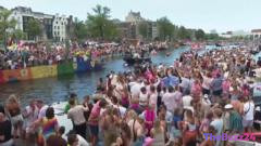 Amsterdam’s Canals Transform into a Vibrant Celebration for WorldPride Parade