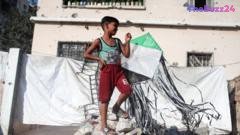 Escalating Tensions: Israel Threatens ‘Forceful’ Response to Gaza Launches Amid Renewed Strikes