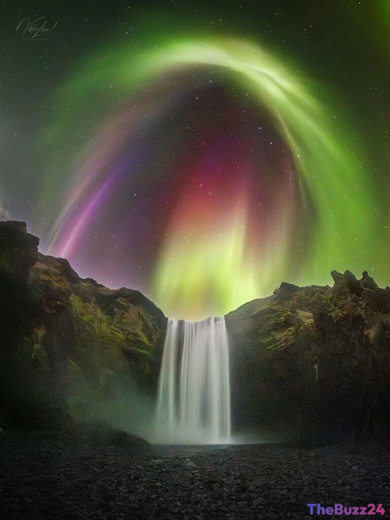 Nature’s Light Show: Stunning Aurora Borealis Illuminates Iceland’s Skógafoss Waterfall