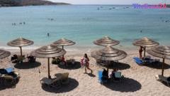 Tragedy at the Shore: Octogenarian Dies Following Violent Beach Dispute Over Sunlounger in Greece