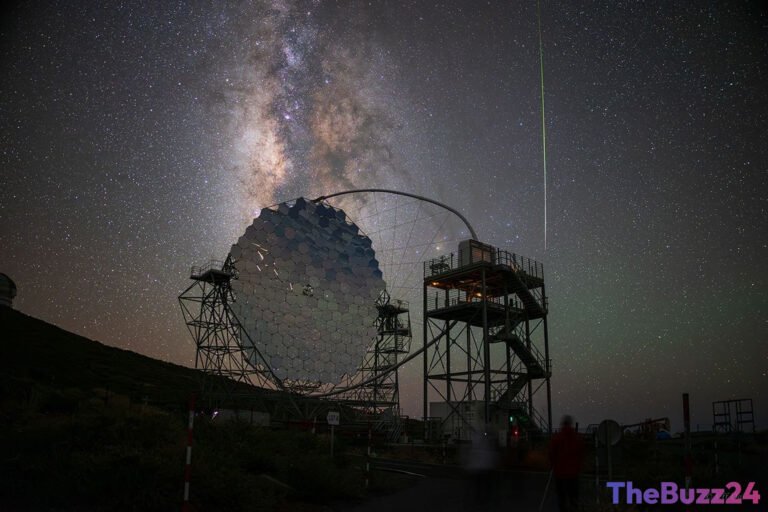 Cosmic Spectacle: Meteor Streaks Across Milky Way Beside Giant Telescope Mirror