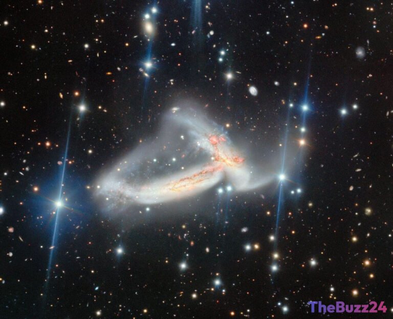 Cosmic Embrace: Twin Galaxies Merge, Sparking New Life and Discovery