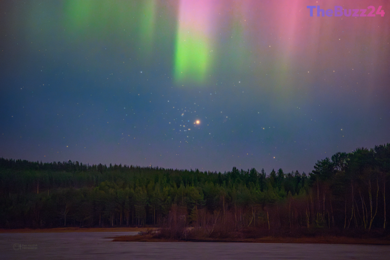 Celestial Alignment: Mars and the Beehive Cluster Shine Beneath Arctic Auroras