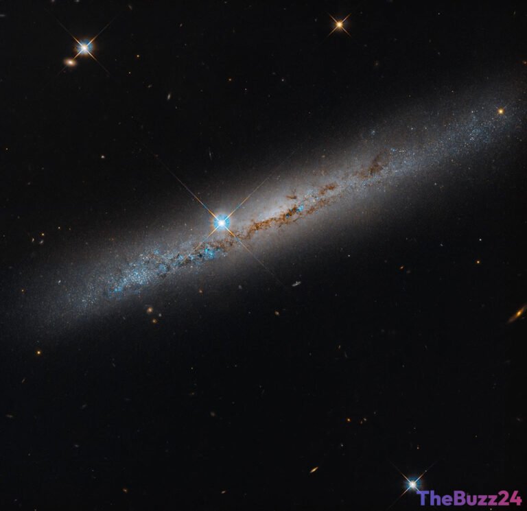 Hubble Unveils Distant Spiral Galaxy NGC 1827, Advancing Cosmological Insights