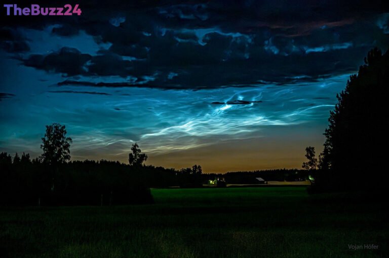 Ethereal Blue Glow: Noctilucent Clouds Dazzle Over Swedish Skies